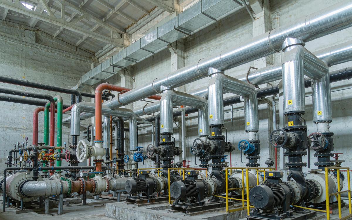 Gypsum slurry pumps and pipe manifolds