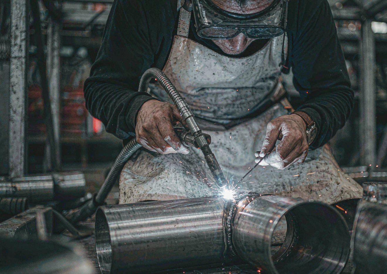 Welding a clad steel joint